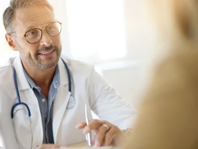 Doctor counselling patient