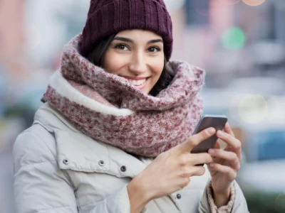Woman in winter smiling